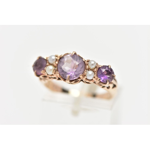 4 - A YELLOW METAL GEM SET RING, designed with three circular cut amethysts, each interspaced with four ... 