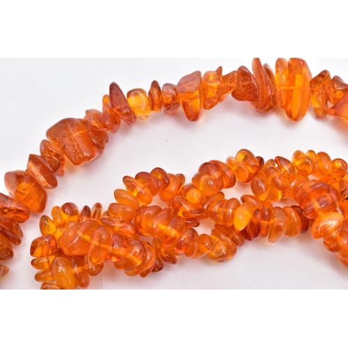 49 - TWO COPAL AMBER NECKLACES, two large necklaces comprised of polished and rough copal amber beads, ap... 