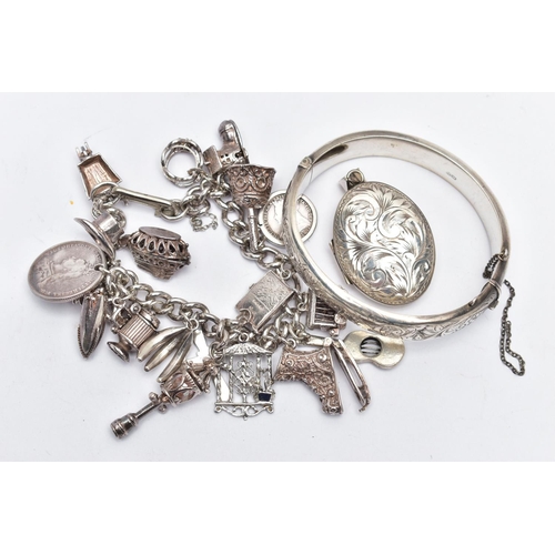 53 - A SELECTION OF SILVER AND WHITE METAL JEWELLERY, to include a silver hinged bangle with scroll embos... 