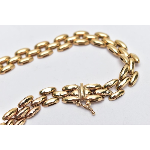 64 - A 9CT YELLOW GOLD BRACELET, brick link bracelet fitted with an push piece clasp, with additional fig... 