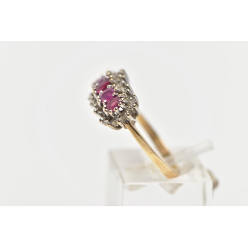 65 - A 9CT YELLOW GOLD RUBY AND DIAMOND CLUSTER RING, the cluster of an oval form, to the center is five ... 