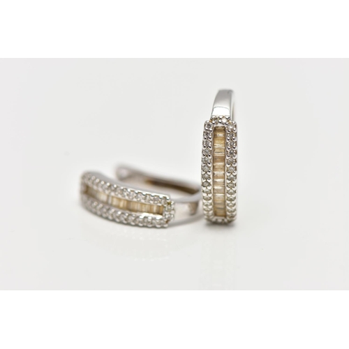 72 - A PAIR OF 9CT WHITE GOLD DIAMOND SET EARRINGS, each of a half hoop, to the center is a row of baguet... 