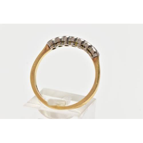75 - AN 18CT GOLD SEVEN STONE DIAMOND RING, a row of collet set round brilliant cut diamonds, estimated t... 