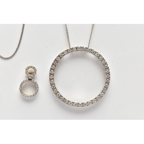 82 - A 9CT WHITE GOLD DIAMOND PENDANT NECKLACE AND MATCHING EARRINGS, the pendant of an openwork circular... 