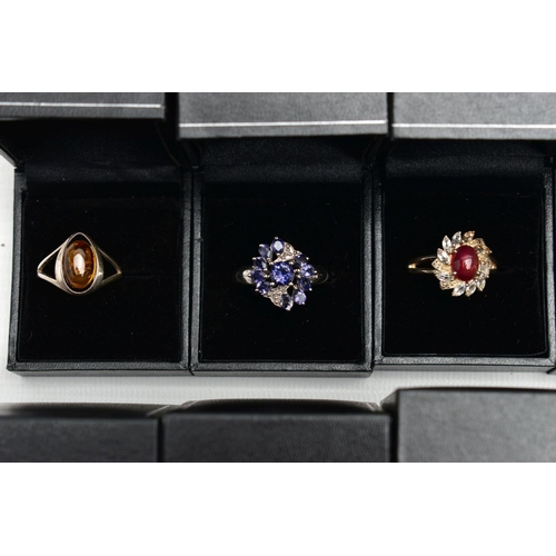 99 - ASSORTED GEM SET RINGS, eighteen colourful gem set dress rings all set in white and yellow metal, ea... 