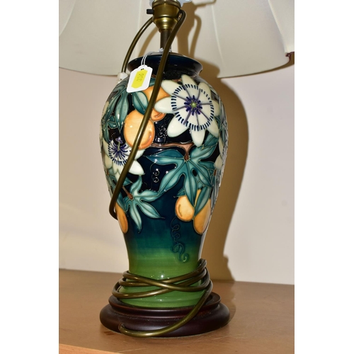 336 - A PAIR OF MOORCROFT POTTERY 'PASSION FLOWER' TABLE LAMPS, of baluster form, with tube lined passion ... 