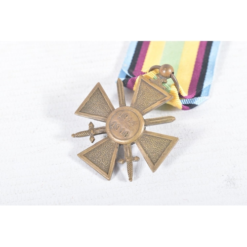 228 - A MIXED PARCEL OF MEDALS FROM VARIOUS COUNTRIES to include an unnamed Purple Heart, an Order Of Beni... 