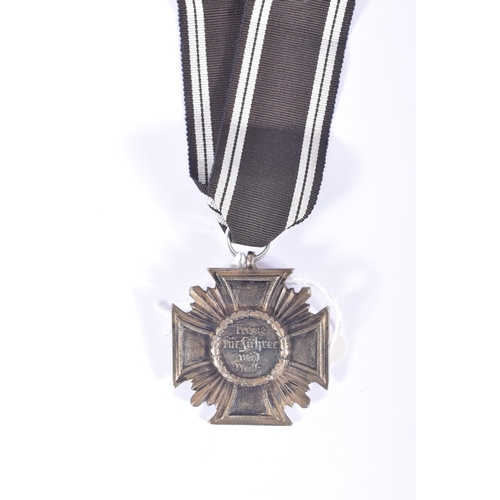 242 - A WW2 NSDAP LONG SERVICE MEDAL, this was awarded for ten years' service in the Nazi party, The Ribbo... 