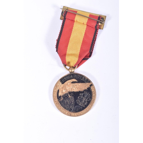 246 - SPANISH CIVIL WAR CAMPAIGN MEDAL, complete with ribbon for service on the front, also include is an ... 