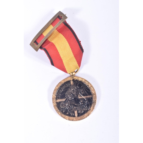 246 - SPANISH CIVIL WAR CAMPAIGN MEDAL, complete with ribbon for service on the front, also include is an ... 