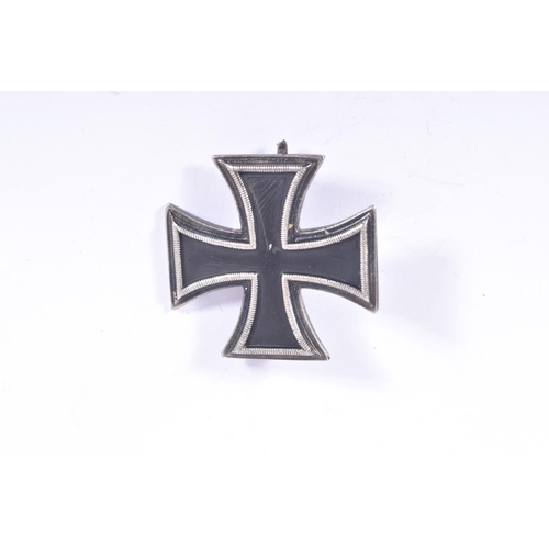 252 - FOUR GERMAN IRON CROSSES, to include a WWI first class iron cross, a 2nd class WWI iron cross and tw... 