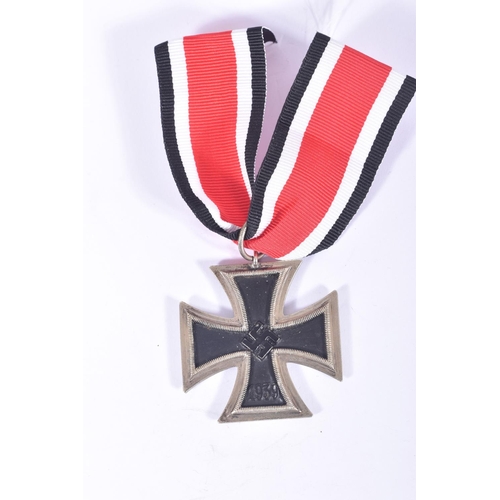 252 - FOUR GERMAN IRON CROSSES, to include a WWI first class iron cross, a 2nd class WWI iron cross and tw... 