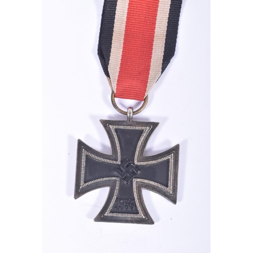 252 - FOUR GERMAN IRON CROSSES, to include a WWI first class iron cross, a 2nd class WWI iron cross and tw... 