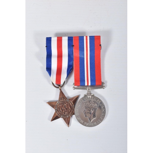 269 - A BOXED PAIR OF WWII MEDALS TO INCLUDE I.D CARDS, the medals are later issues but have been mounted ... 