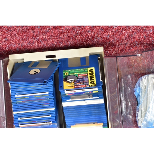 26 - LARGE QUANTITY OF AMIGA GAMES, three boxes containing over one hundred and thirty officially release... 