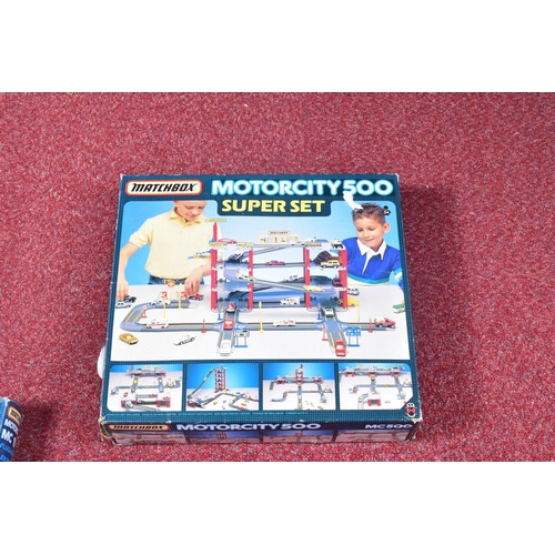 67 - THREE BOXED MATCHBOX MOTORCITY PLAYSETS, Airport, No.MC150, Railway, No.MC250 and Garage Super set, ... 