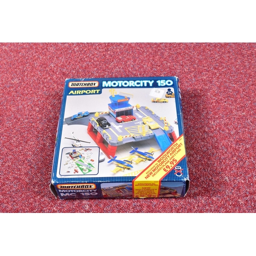 67 - THREE BOXED MATCHBOX MOTORCITY PLAYSETS, Airport, No.MC150, Railway, No.MC250 and Garage Super set, ... 