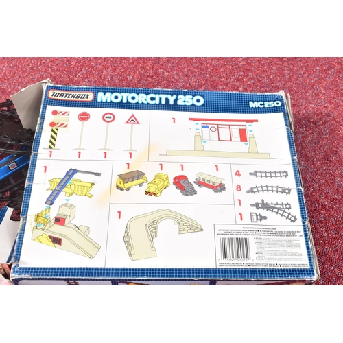 67 - THREE BOXED MATCHBOX MOTORCITY PLAYSETS, Airport, No.MC150, Railway, No.MC250 and Garage Super set, ... 