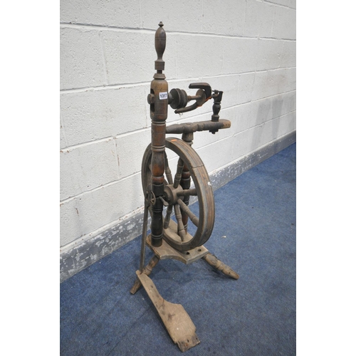 1317 - AN ANTIQUE SPINNING WHEEL (condition:-distressed and ideal for restoration)