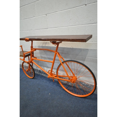 1320 - A CONTEMPORY BESPOKE SIDE TABLE, made from a vintage bicycle, painted in orange, forming of two tier... 