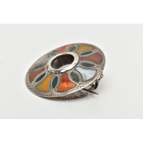 103 - A SCOTTISH AGATE BROOCH, of a circular form set with various agates, in a white metal mount unmarked... 