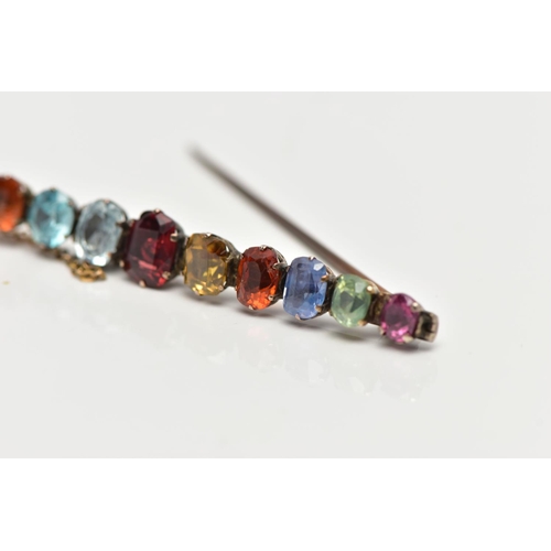 107 - A YELLOW METAL MULTI GEMSTONE BAR BROOCH, designed with a row of vary cut gemstones, each claw set, ... 