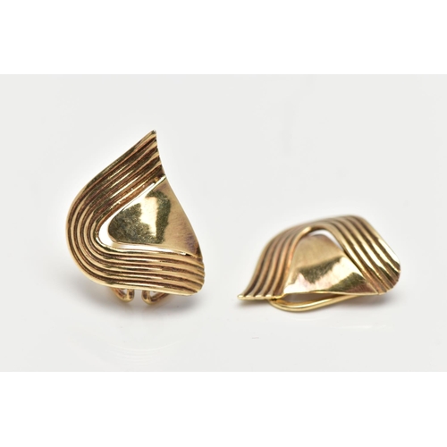 11 - A PAIR OF 9CT GOLD EARRINGS, yellow gold clip on earrings, abstract design with grooved surround, ap... 