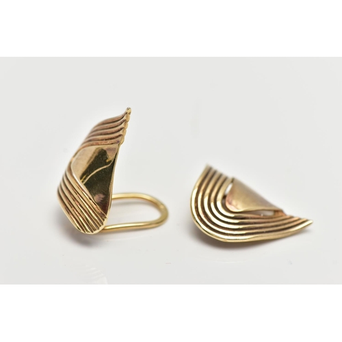 11 - A PAIR OF 9CT GOLD EARRINGS, yellow gold clip on earrings, abstract design with grooved surround, ap... 