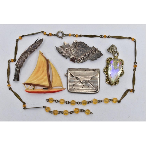 122 - SIX PIECES OF JEWELLERY, to include a white metal sweet heart brooch, inscribed with the word 'Mothe... 