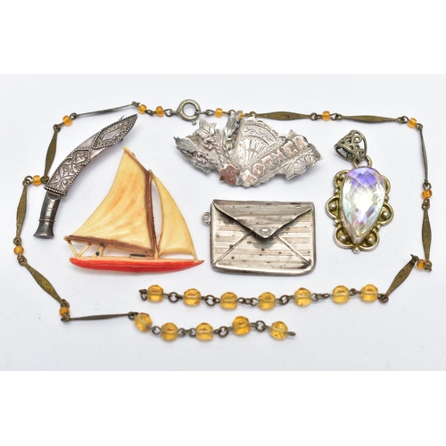 122 - SIX PIECES OF JEWELLERY, to include a white metal sweet heart brooch, inscribed with the word 'Mothe... 