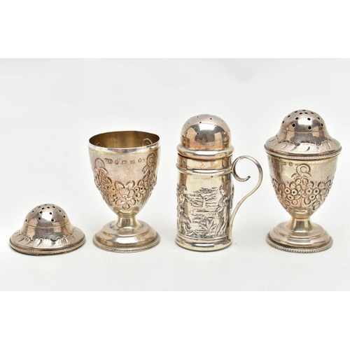 131 - THREE SILVER PEPPERETTES, two matching pepperettes decorated with a floral design, hallmarked 'Georg... 