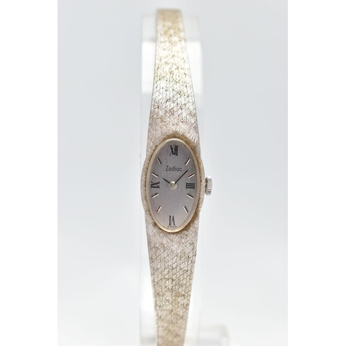 3 - A LADIES 18CT WHITE GOLD 'ZODIAC' WRISTWATCH, manual wind, oval silver dial signed 'Zodiac', alterna... 