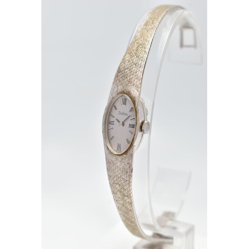 3 - A LADIES 18CT WHITE GOLD 'ZODIAC' WRISTWATCH, manual wind, oval silver dial signed 'Zodiac', alterna... 