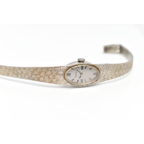 3 - A LADIES 18CT WHITE GOLD 'ZODIAC' WRISTWATCH, manual wind, oval silver dial signed 'Zodiac', alterna... 