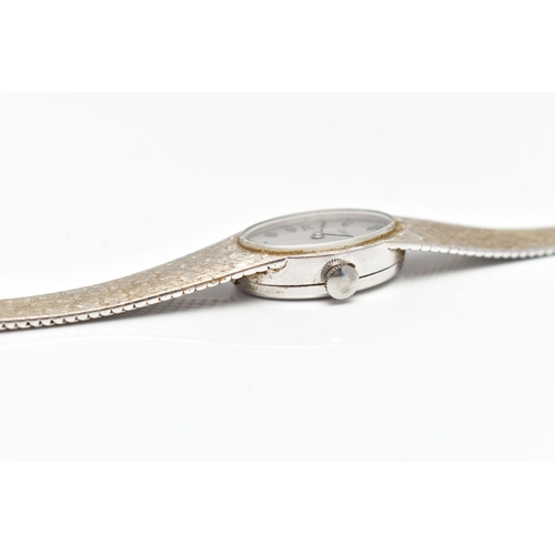 3 - A LADIES 18CT WHITE GOLD 'ZODIAC' WRISTWATCH, manual wind, oval silver dial signed 'Zodiac', alterna... 