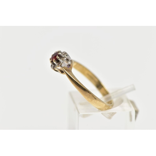 30 - A 9CT GOLD GARNET AND PASTE CLUSTER RING, the principal garnet, within a colourless paste surround, ... 