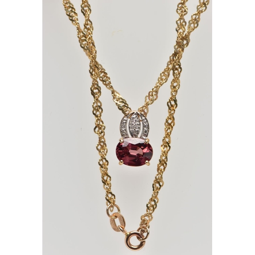 31 - A 9CT YELLOW GOLD SPINEL AND DIAMOND PENDANT WITH CHAIN, the pendant set with a principal purplish r... 