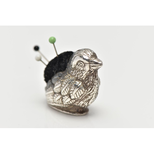 32 - A SILVER NOVELTY PIN CUSHION, designed as a chick, approximate length 40mm, maker's mark H&SJ?, hall... 