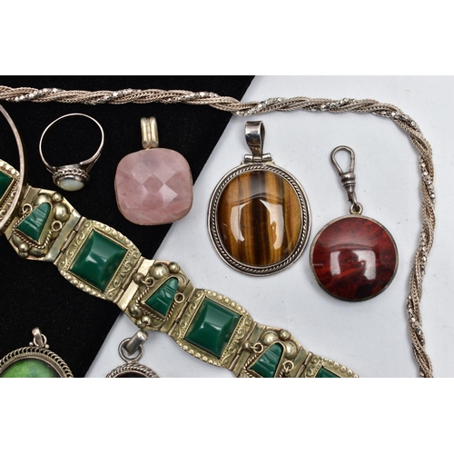 33 - A COLLECTION OF SILVER AND WHITE METAL GEM SET JEWELLERY, to include a tiger's eye bangle, Swedish h... 