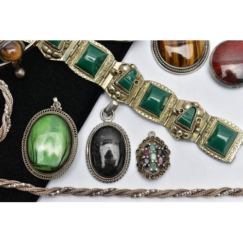 33 - A COLLECTION OF SILVER AND WHITE METAL GEM SET JEWELLERY, to include a tiger's eye bangle, Swedish h... 