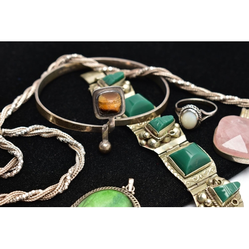 33 - A COLLECTION OF SILVER AND WHITE METAL GEM SET JEWELLERY, to include a tiger's eye bangle, Swedish h... 