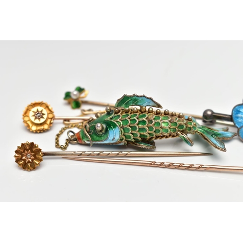 38 - SIX ITEMS OF JEWELLERY, to include an articulated enamel fish, a blue enamel flower bar brooch, a pe... 