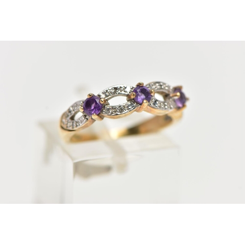 48 - A 9CT YELLOW GOLD, AMETHYST AND DIAMOND RING, designed with three claw set, circular cut amethysts, ... 