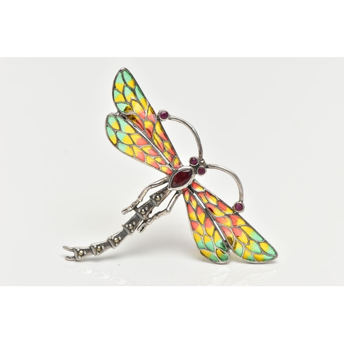 54 - A WHITE METAL PLIQUE A JOUR BROOCH/PENDANT, in the form of a dragonfly, set with ruby eyes and anten... 