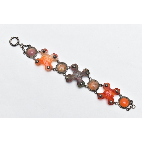 7 - A SCOTTISH AGATE BRACELET, designed with three carved cross banded agates, interspaced with linked c... 