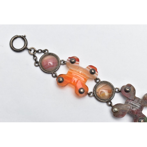 7 - A SCOTTISH AGATE BRACELET, designed with three carved cross banded agates, interspaced with linked c... 