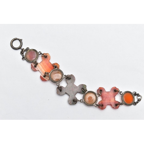 7 - A SCOTTISH AGATE BRACELET, designed with three carved cross banded agates, interspaced with linked c... 