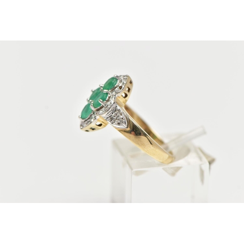 71 - A 9CT YELLOW GOLD, EMERALD AND DIAMOND DRESS RING, of a marquise form, centrally set with four, claw... 