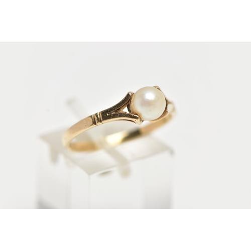 72 - A 9CT YELLOW GOLD CULTURED PEARL RING, centering on a single tension set, cultured white pearl with ... 