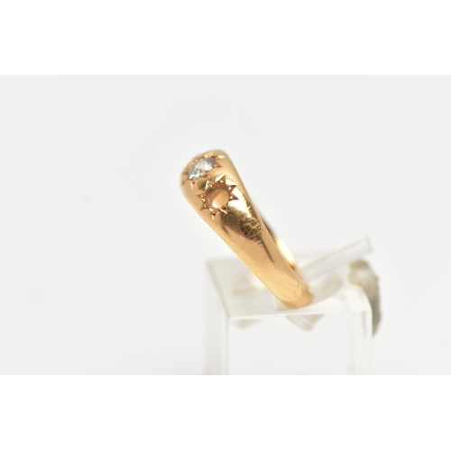 80 - A 18CT GOLD THREE STONE GYPSY RING, a AF yellow gold ring centrally set with a single old cut diamon... 